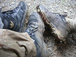 schlammige Bergschuhe nach der Tour